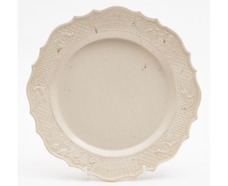 A Staffordshire white saltglaze 'King of Prussia' plate: of silver shape, the scallop edged rim inscribed 'The King of Prussi