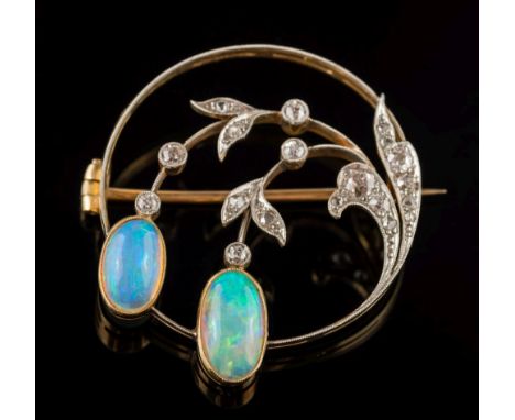 An opal and diamond circular brooch: mille-grain set with graduated, old-cut diamonds and two oval opals, total diamond weigh