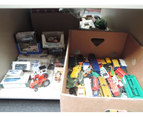 A shelf of modern die-casts including Britains, Corgi etc