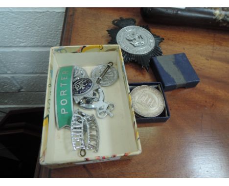 A collection of British Transport Police, St John's Ambulance badges, three Middlesex Army Cadet medals, two are silver