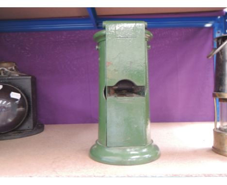 A Edmundson cast iron ticket stamping machine, in green with brass plaque