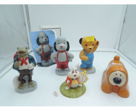 Three  Camtrak's Childhood Favourites by Wade figures, Sooty, Sweep and Dougal, a similar Frog and White Rabbit (af)