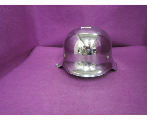 A German WWII Steel Helmet chromed with leather lining