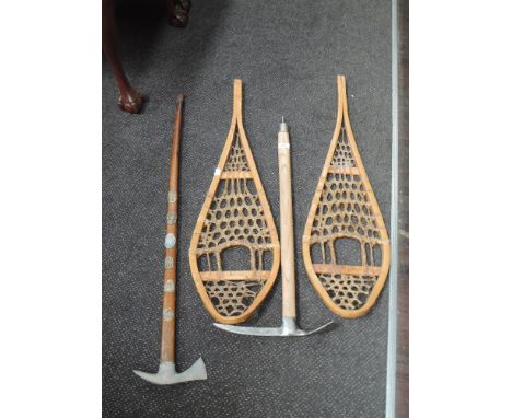 A vintage Fralling Fulpmes Himalaya Pickel Ice Axe, a pair of vintage Gros Louis wooden and leather bindings Snow Shoes and a