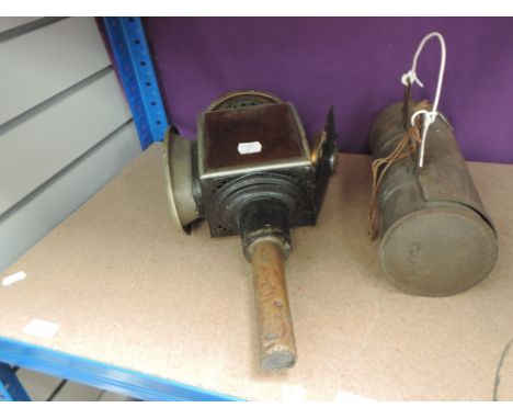 A vintage carriage lamp having amber glass panes and burner named Deason, Windermere along with a tin candle box containing c