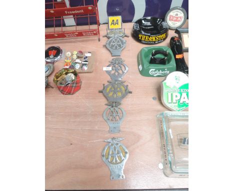 A selection of seven AA motor car hood and engine badges including Motor cycle and Jamaica 