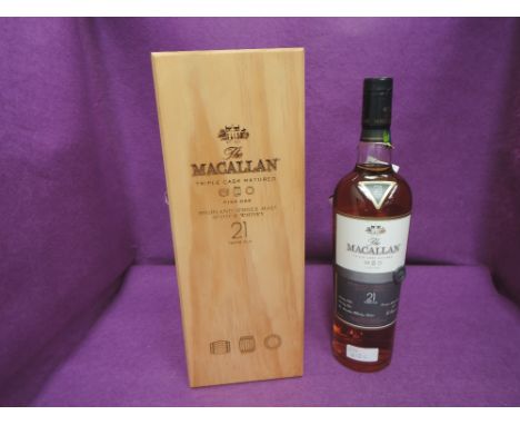 A bottle of The Macallan, Triple Cask Matured, Fine Oak, Single Malt Whisky,21 year old, 43 % 70cl, in original display case 