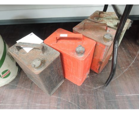 A selection of four motor and engine oil fuel cans Shell Redline 