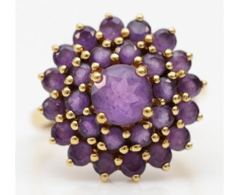 A 9ct gold and amethyst cluster ring, diameter 16mm, L, 3.3gm 