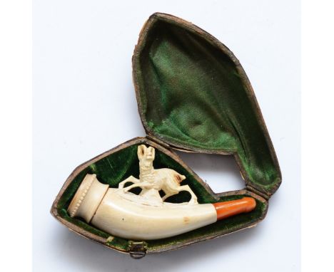 A carved meerschaum pipe, in the form of a ram, 8cm, case 
