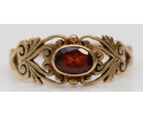 A 9ct gold and garnet dress ring, M, 1.8gm 