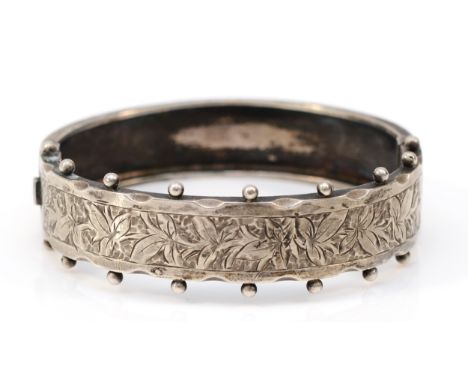 A Victorian unmarked silver hinged bangle, 53 x 51mm, 16gm 