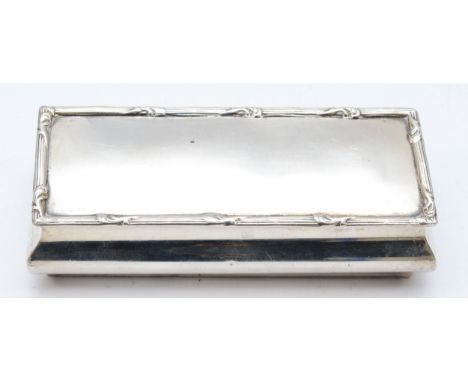 A rectangular silver trinket box, Chester 1922,  with hinged cover, 10.5 x 4.5 x 2.5cm, 83gms 