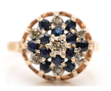 A 9ct gold sapphire and diamond cluster ring, K 1/2, 2.3gm 