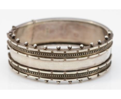 A Victorian silver hinged bangle, Birmingham 1882, 56 x 45mm, 30gm 