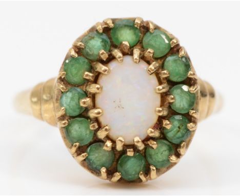 A 9ct gold opal and emerald cluster ring, Q, 3.1gm,&nbsp;London 1978, needs a clean, all stones appear original and are in go