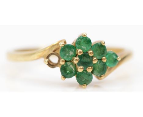 A 9ct gold and emerald cluster ring, one setting vacant, Q 1/2, 2.2gm 