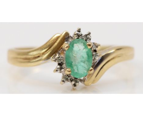 A 9ct gold emerald and single cut diamond cluster ring, O, 1.8gm. 