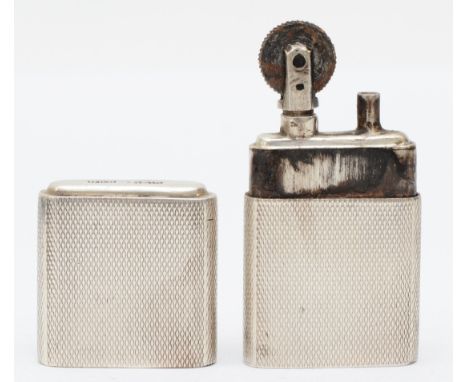 The Howitt Lighter, a silver petrol lighter, Sheffield 1946. 