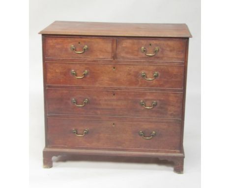 A George III mahogany chest of drawers, with two short and three long graduated drawers raised on ogee bracket feet, 101cm x 