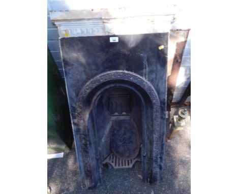 A Victorian white painted cast iron bedroom fire surround, 60cm x 91.5cm, and a black surround, 51cm x 91cm, (2).