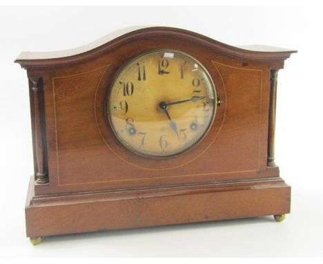 An Edwardian mahogany and boxwood line inlaid mantel clock, of architectural form, dial bearing Arabic numerals, eight day mo