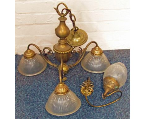 A cut glass and brass pendant light, and a brass three branch chandelier with fluted glass shades, 68cm drop.