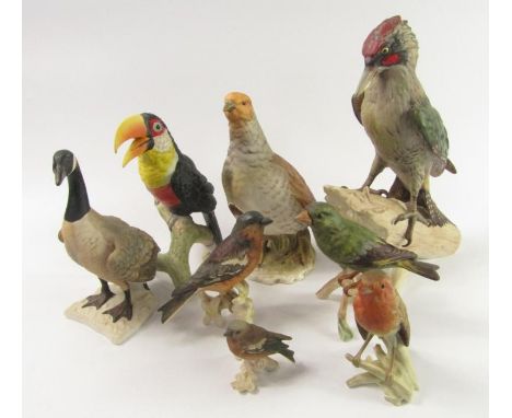 W Goebel bird sculptures, comprising Robin, Green Billed Toucan, Green Woodpecker, Green Finch, Partridge, Chaffinch, Canada 