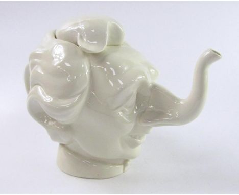 A Luck and Flaw white glazed pottery teapot, modelled as Margaret Thatcher, impressed marks.