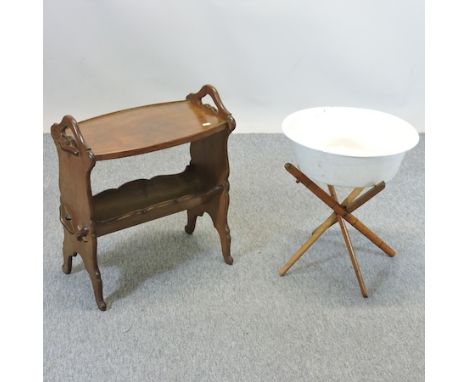 An Arts and Crafts oak magazine rack/table, 51cm, together with a folding campaign enamel bowl on stand