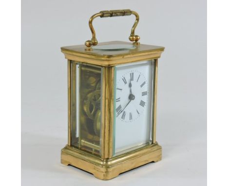 A French brass cased carriage clock, with key, 11cm high