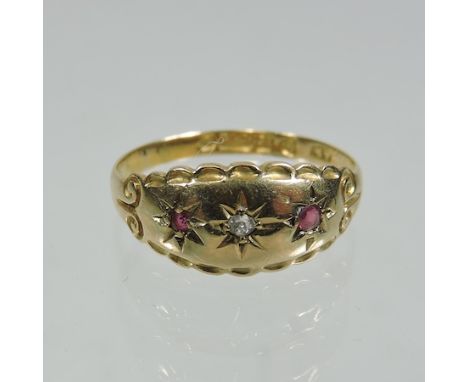 A 15 carat gold ruby and diamond ring