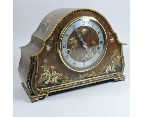 A 1930's chinoiserie decorated mantel clock, 23cm high, with presentation inscription for Charles Sheridan Stevens, 1940