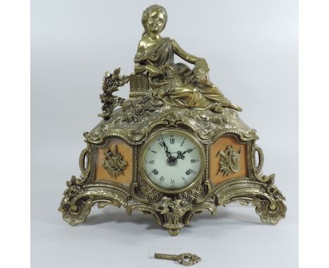 A 19th century continental style brass mantel clock, 37cm high