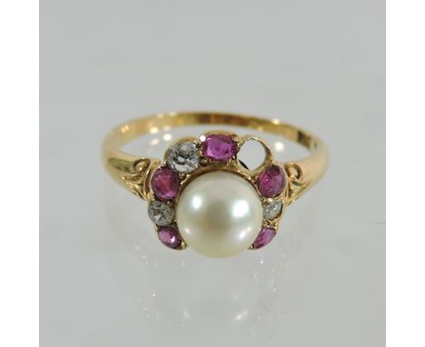 An 18 carat gold, ruby, diamond and pearl horseshoe ring, boxed