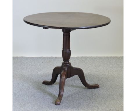 A George III oak occasional table, on a tripod base, 79cm