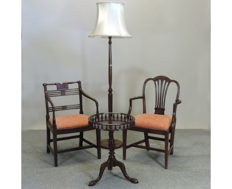 A near pair of Regency mahogany open armchairs, together with an occasional table and a standard lamp