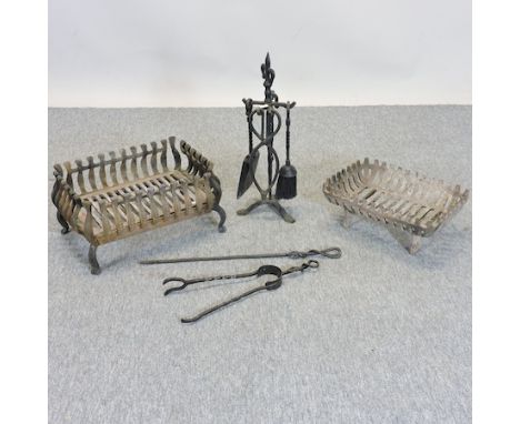 A cast iron fire grate, 46cm, together with another and various fire tools