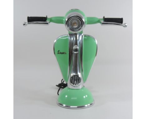 A painted metal table lamp, in the form of a vespa, 42cm high