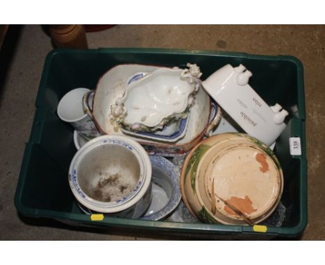 A box of miscellaneous ceramic planters