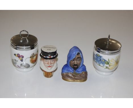 A Royal Worcester Othello candle snuffer, two egg coddlers and a Beefeater bottle stopper