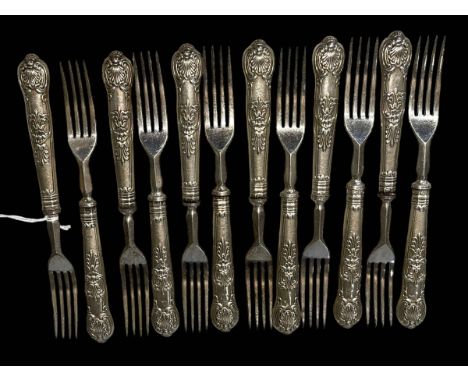 Set of twelve shell and scroll silver handled dessert forks.