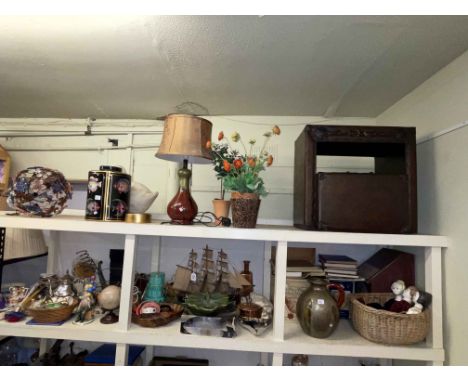 Leather nest of tables, table lamp, vases, light fitting, model galleon, books, dolls and collectables.