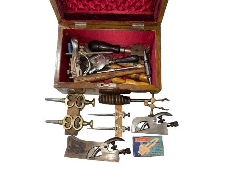 Victorian walnut box with vintage tools.