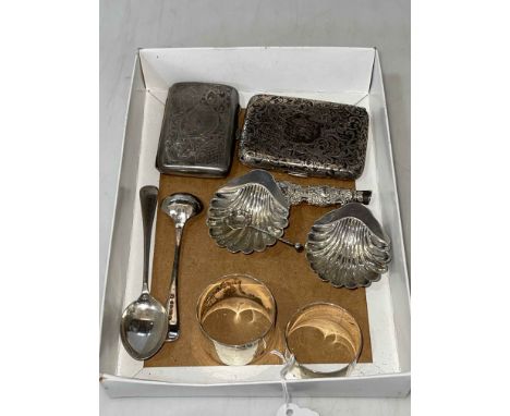 Silver items comprising two cigarette cases, shell salts, two napkin rings and two spoons.