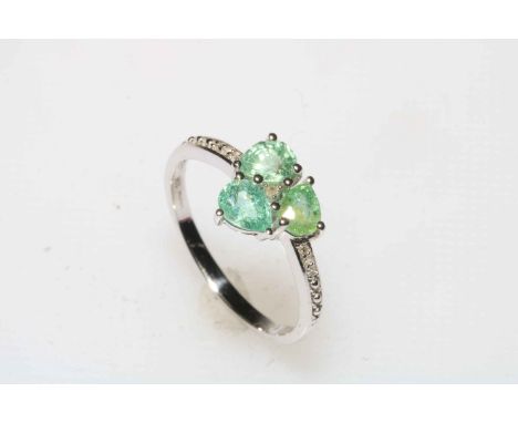 Paraiba Tourmaline and diamond limited edition 9 carat gold ring, size N/O, with certificate.