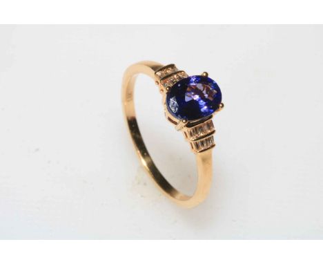 Tanzanite and diamond 18 carat gold ring, size R/S, with certificate.