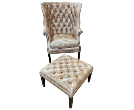 Tetrad Bradley light tan buttoned and studded leather barrel back porters chair and footstool.