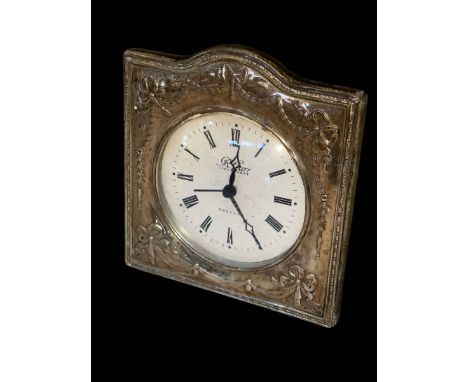 Embossed silver mounted mantel clock, 15cm.