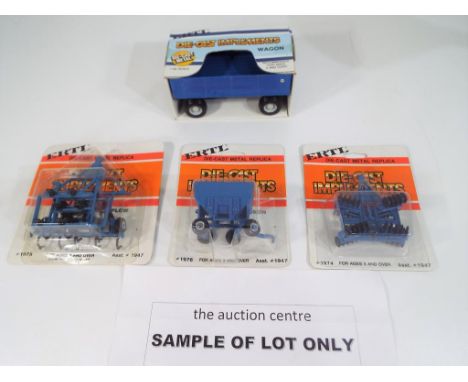 Ertl - 24 replica diecast implements, 1:64 scale, mint in blister packs, stock No. 1947 and one 1:32 scale stock No. 1977